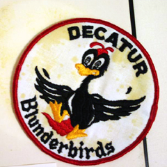 A patch recently removed from exhibit at the National Model Aviation Museum that is yellowed from the adhesive used to display it.