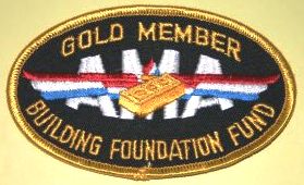 To encourage monetary donations towards the building costs. several levels of donation to the building fund were set up and donor received various items at each level.  This patch indicated that the donor had given at the Gold level, or the highest level towards the building fund.  (Source: National Model Aviation Museum Collection, AMA Collection, 2005.02.101.)
