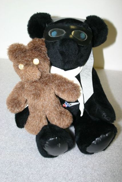 Two bears made by Dolly.  The smaller one is the type that she would take as a kit to international events.  (Source: National Model Aviation Museum Collection, donated by Jay Mealy, 2010.44.01-.02.)