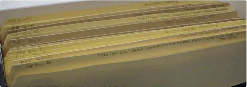 Document files in an acid-free box, ready for research at the National Model Aviation Museum.